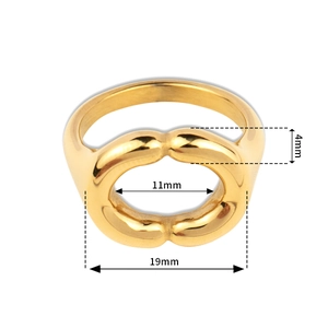 Macro shot of gold geometric ring with dimensions 4mm, 11mm, and 19mm on white background