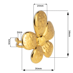Detail showing the hammered texture and dimensions of the golden metal flower earring