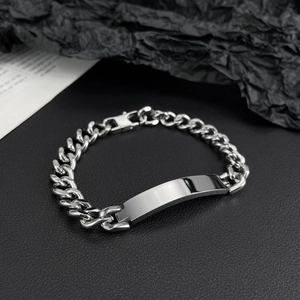 Sleek stainless steel Cuban link bracelet with a polished ID plate for men and women
