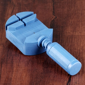 Blue watch band link remover tool with metal pin for strap adjustment and repairs
