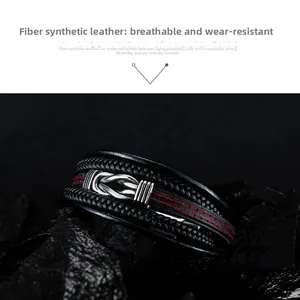 Detail view of multi-layer black braided leather bracelet with silver twist metal buckle