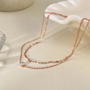 Bracelet de cheville double en titane or rose avec oxyde de zirconium et chaîne pailletée