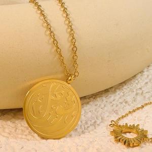 Gold stainless steel coin necklace with Arabic calligraphy and sun charm on cable chain