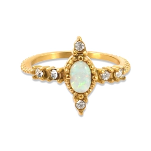 Bague vintage dorée avec opale ovale et zircons au design rétro en forme de croix