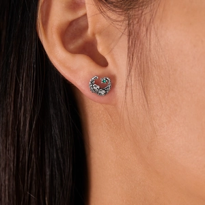 Vintage oxidized silver stud earring with rose relief and green gemstone for men