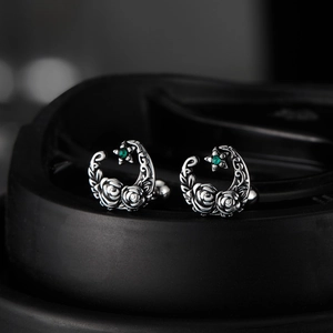 Retro hip hop crescent moon stud earrings in vintage silver with green gemstones