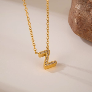 Detail shot of gold-plated Z-letter necklace with micro-paved cubic zirconia stones