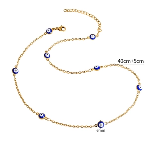 Collana in acciaio inossidabile dorato con perline occhio greco blu e chiusura a moschettone