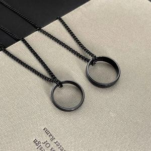 Minimalist black stainless steel crown rings on chains with unique mesh texture