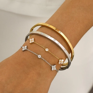 Elegant gold and silver stainless steel bangles and flower bracelets set with cubic zirconia