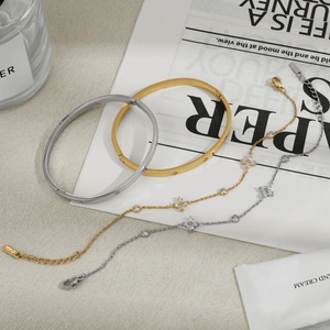 Minimalist stainless steel clover bracelets and bangles set in gold and silver finish