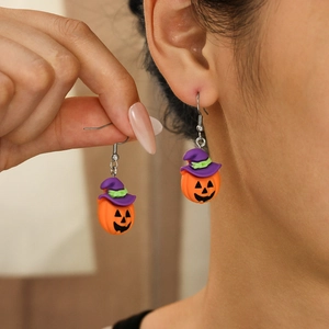 Halloween pumpkin earrings with purple wizard hats on stainless steel hooks for women