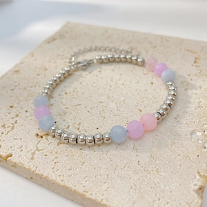 Detail of beaded bracelet with natural Morganite stones and stainless steel beads