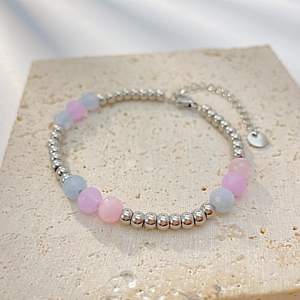 Minimalist stainless steel bracelet with pastel natural stones and silver beads on stone