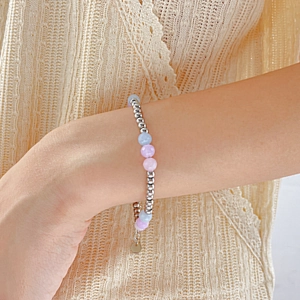 Minimalist stainless steel beaded bracelet with natural pastel morganite stones and charm