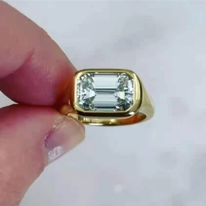18k gold plated stainless steel wide ring with large rectangular emerald cut clear zircon
