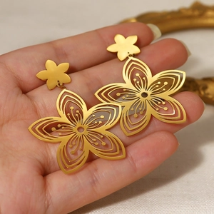 Stylish 18K gold-plated titanium steel hollow flower drop earrings for women