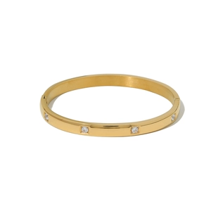Bracelet ajustable en acier inoxydable doré 18 carats avec quatre zircons incrustés