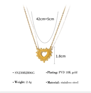 Detail of 18K gold plated heart pendant with sunburst texture and sizing dimensions