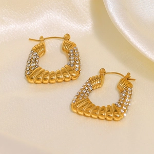 Pendientes de aro de acero inoxidable chapado en oro de 18k con circonitas y diseño de espiral