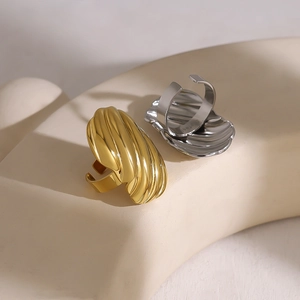 Abstracte roestvrijstalen ringen in schelpstijl, goud- en zilverkleurig en verstelbaar