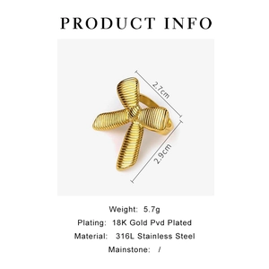 Detail of 18K gold PVD coated 316L stainless steel bow ring with vertical texture