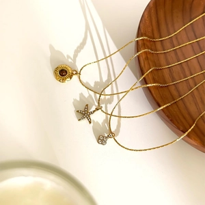 Three-piece gold layered starfish and tiger eye flower pendant necklace set for women