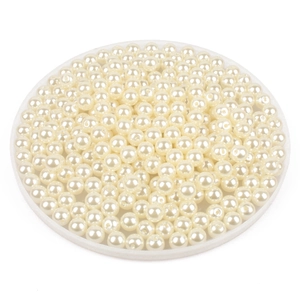 Cuentas de perlas ABS marfil pulido para bisutería DIY en un cuenco blanco redondo