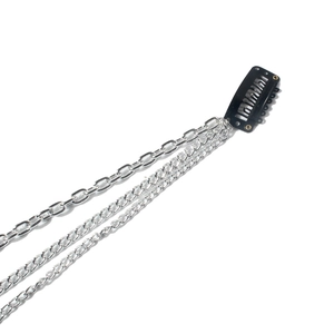 Silver multi-layered punk style hair chain headpiece with black BB clip on white backdrop