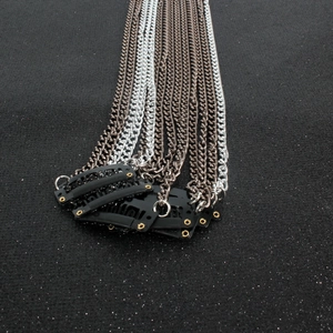 Chaînes de cheveux à pompons argent et bronze avec clips en U pour coiffure chic