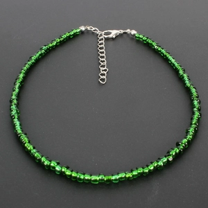 Detail of bohemian green translucent seed bead choker with adjustable lobster clasp