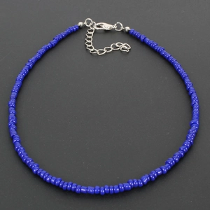 Detailed view of bohemian cobalt blue seed bead choker with adjustable lobster clasp