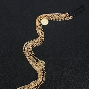 Layered gold tassel hair chain extension with vintage coins and black clips for women