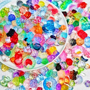 Colorful glass beads in flower and heart shapes for DIY jewelry making and crafts