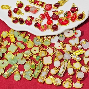 Macro view of Chinese style butterfly pendants with pearls and colorful alloy charms