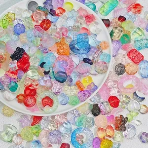Colorful heart-shaped glass beads and DIY jewelry findings for handmade crafts