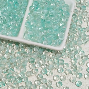 Détail de perles en verre gelée vert menthe 6/8mm pour la fabrication de bijoux DIY