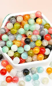 Macro shot of 8/10mm starry resin beads with mermaid shimmer for DIY jewelry making