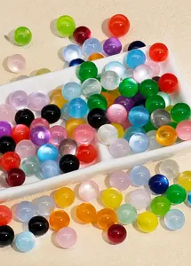 Detailed view of colorful cat eye resin beads for DIY jewelry making in multiple vibrant shades