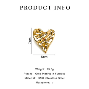 Detail showing 316L stainless steel gold heart brooch with hammered texture 7cm x 6cm