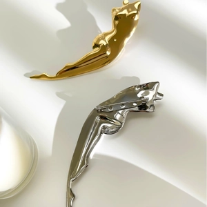 Polished leopard body brooches in gold and silver finish with secure safety clasp back