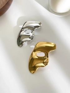 Polished theater mask pins in gold and silver finish with smooth mirror-like surface