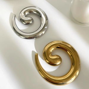 Polished gold and silver snail twist spiral brooches in minimalist stainless steel