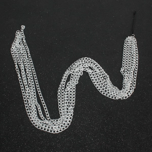 Silver multi-layer hair chain headpiece on black glitter background for women