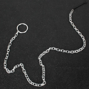 Silver metal chain hair clip with elegant tassels and oval links on a black background
