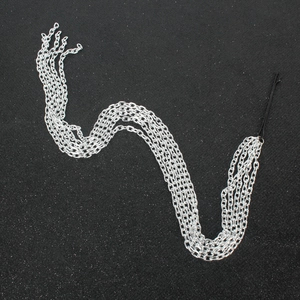Multi-layer silver chain hair extension with clip-in tassel for stylish hair styling