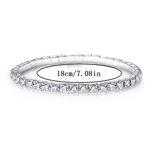 Detail showing an 18cm flexible silver tennis bracelet with clear square-cut crystals