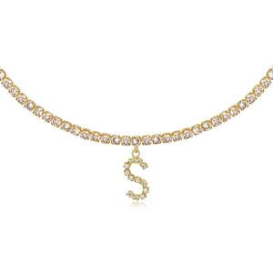Close-up of gold S-letter pendant necklace featuring sparkling paved cubic zirconia