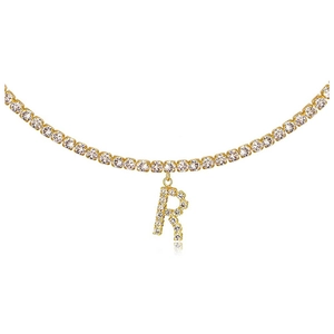 Macro detail of gold tennis chain featuring a cubic zirconia encrusted capital letter R