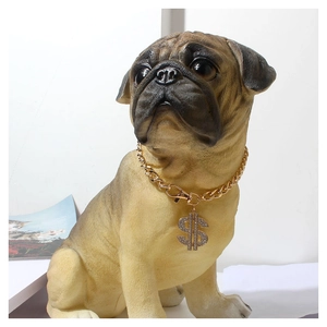 Gold pet chain with iced-out dollar sign pendant worn by a pug statue in hip-hop style